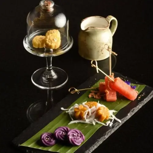 Selection of petit fours and tea